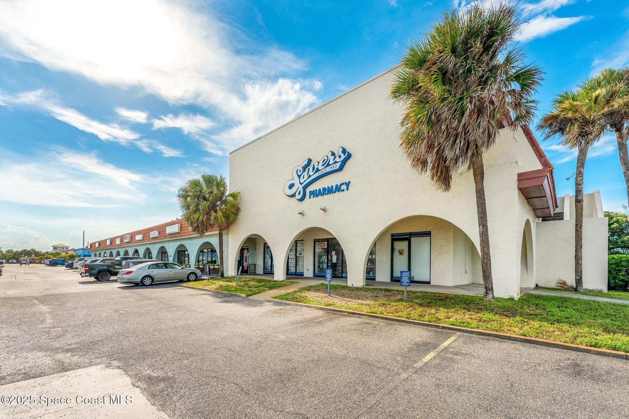 411 Poinsettia Road Melbourne Beach, FL 32951 - Photo 65 of 78 a view of multiple houses with a street