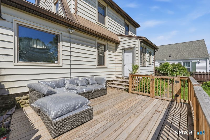 443 Highland Avenue Waterbury, CT 06708 - Photo 23 of 24 a view of a house with wooden floor