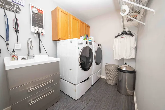 a bathroom with a sink and mirror