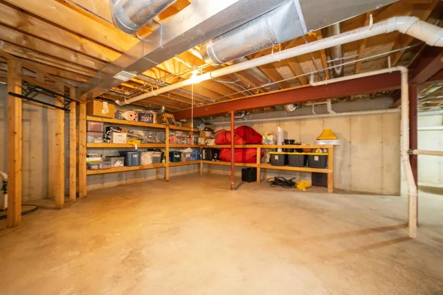 a view of a room with wooden walls