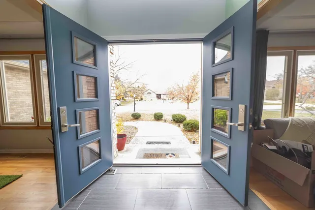 a view of an entryway with a fireplace