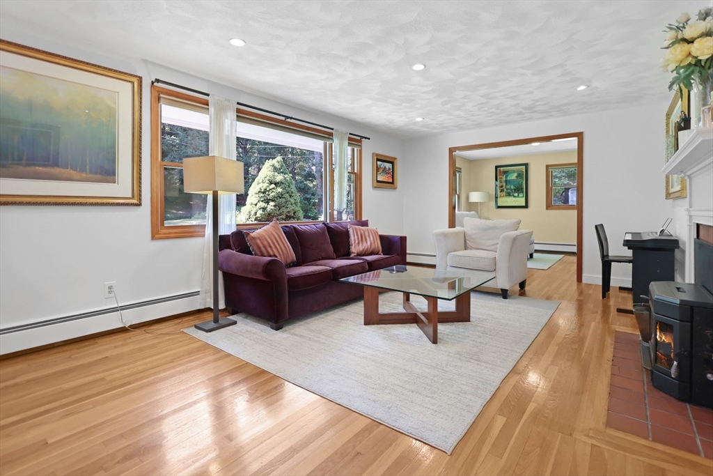401 River Road Andover, MA 01810 - Photo 3 of 32 a living room with furniture and a large window