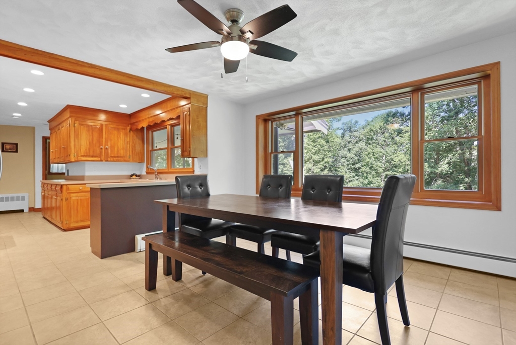 401 River Road Andover, MA 01810 - Photo 7 of 32 a view of a dining room with furniture window and outside view