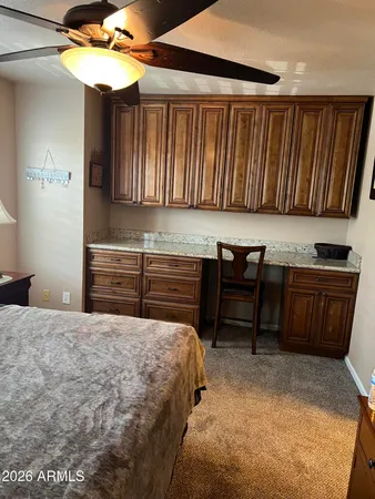 a view of kitchen with furniture and a fireplace