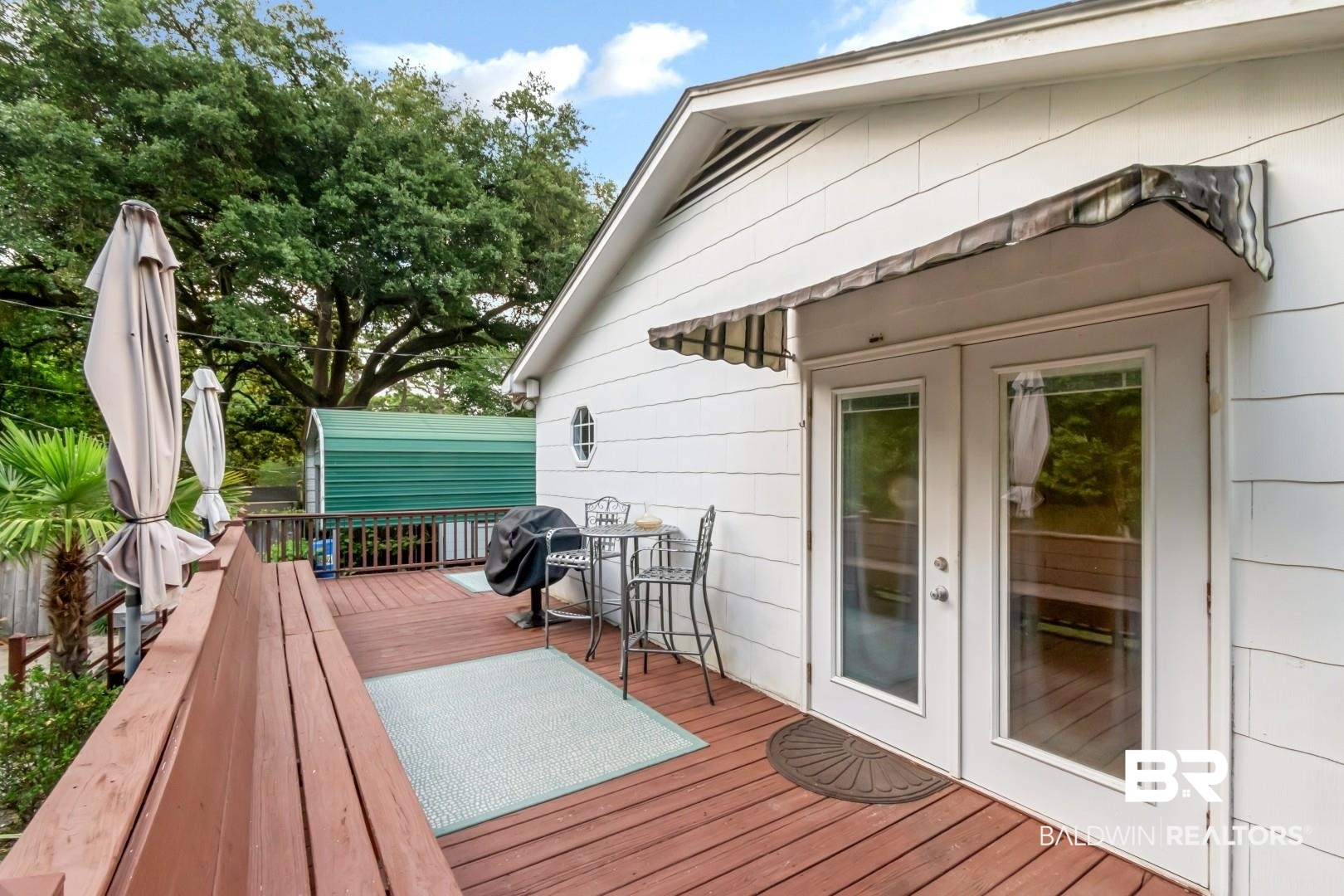 33 Lancaster Road Mobile, AL 36608 - Photo 23 of 40 Wooden deck with french doors