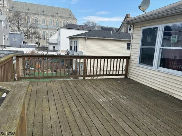a view of a house on wooden deck