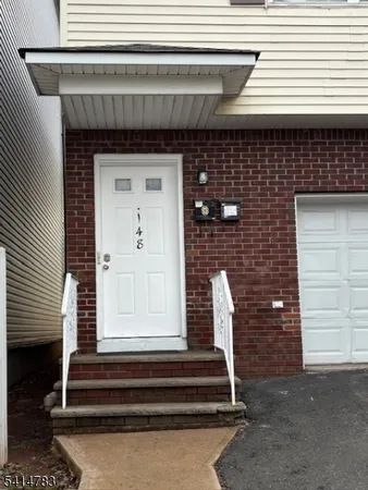 a front view of a house with entryway