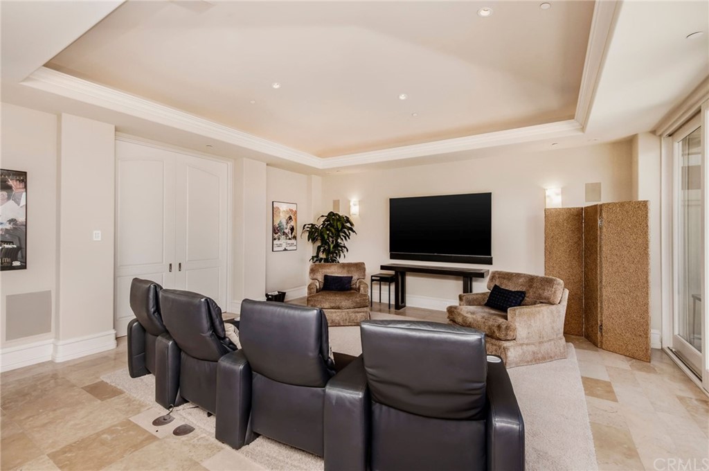 33 Monarch Bay Drive Dana Point, CA 92629 - Photo 14 of 46 a living room with furniture and a flat screen tv