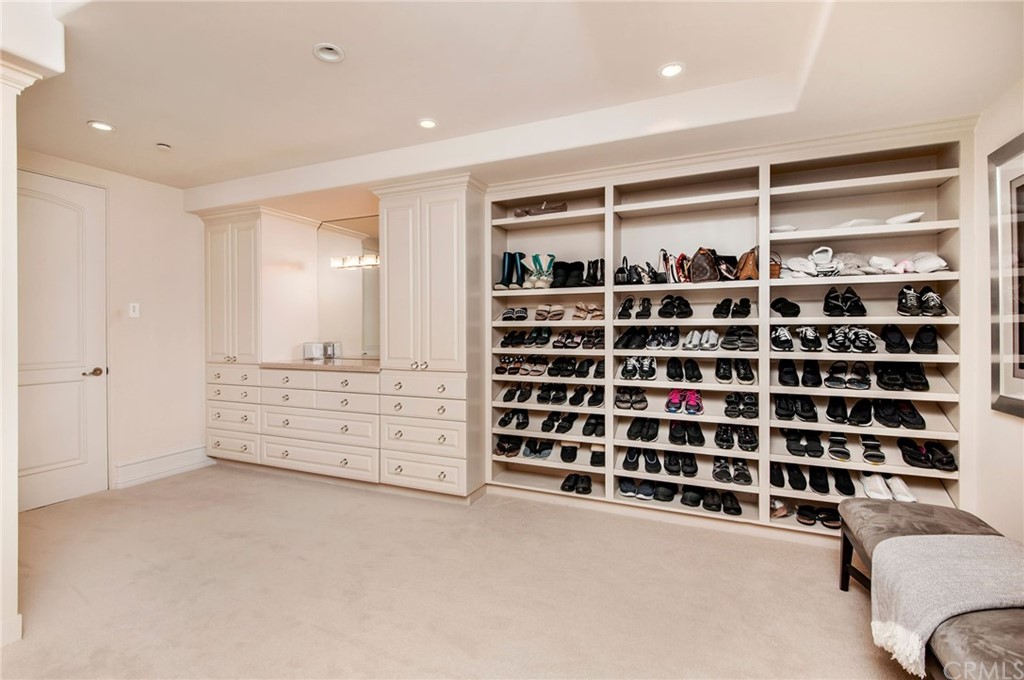 33 Monarch Bay Drive Dana Point, CA 92629 - Photo 20 of 46 a view of an empty room with shelves and a window