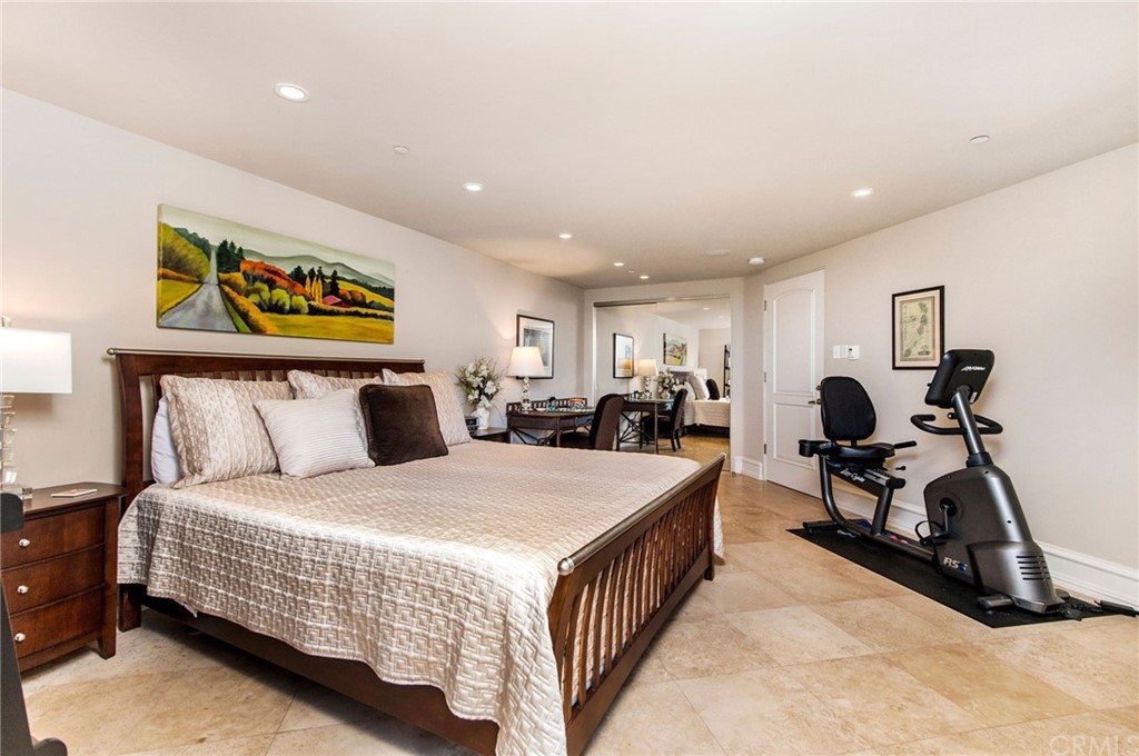 33 Monarch Bay Drive Dana Point, CA 92629 - Photo 30 of 46 a bed room with a bed and dresser