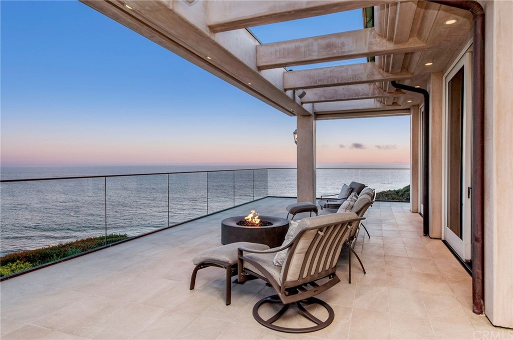 33 Monarch Bay Drive Dana Point, CA 92629 - Photo 36 of 46 a view of a balcony with chair and wooden floor