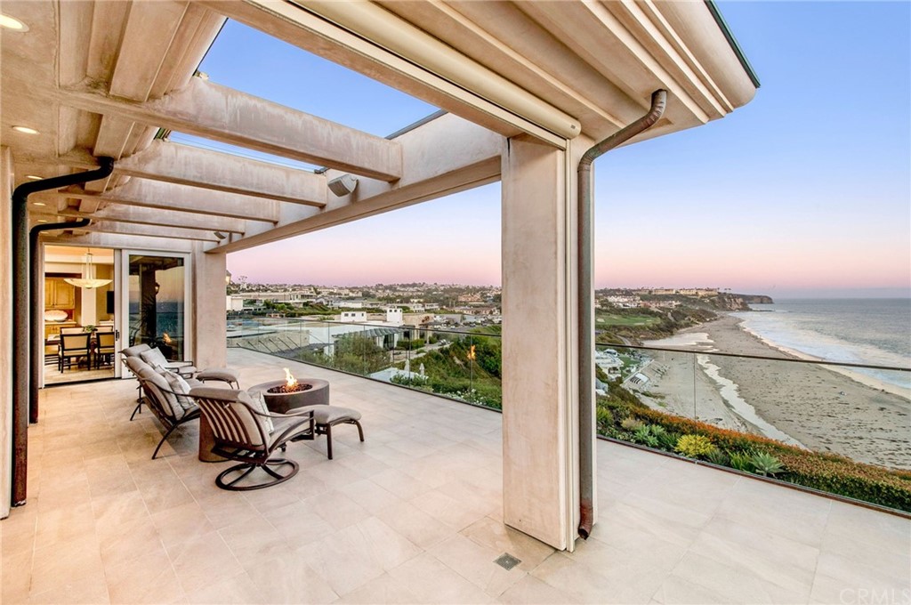 33 Monarch Bay Drive Dana Point, CA 92629 - Photo 37 of 46 a view of a ocean with couches and table