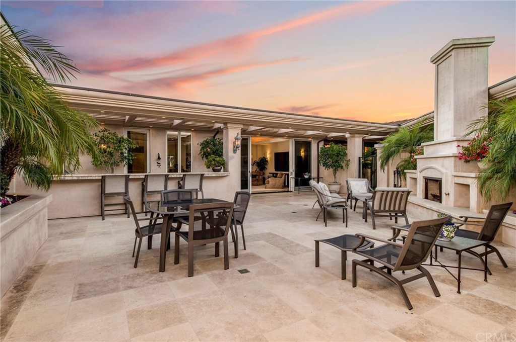 33 Monarch Bay Drive Dana Point, CA 92629 - Photo 38 of 46 a view of a dining area with furniture and a potted plant