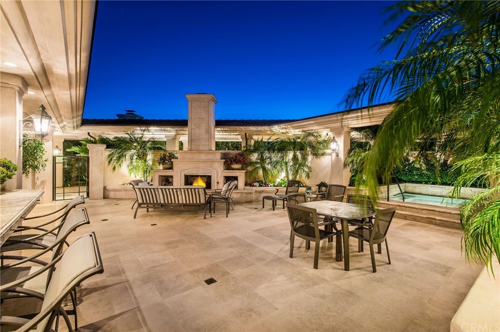 33 Monarch Bay Drive Dana Point, CA 92629 - Photo 39 of 46 a view of a patio with a table and chairs and couches