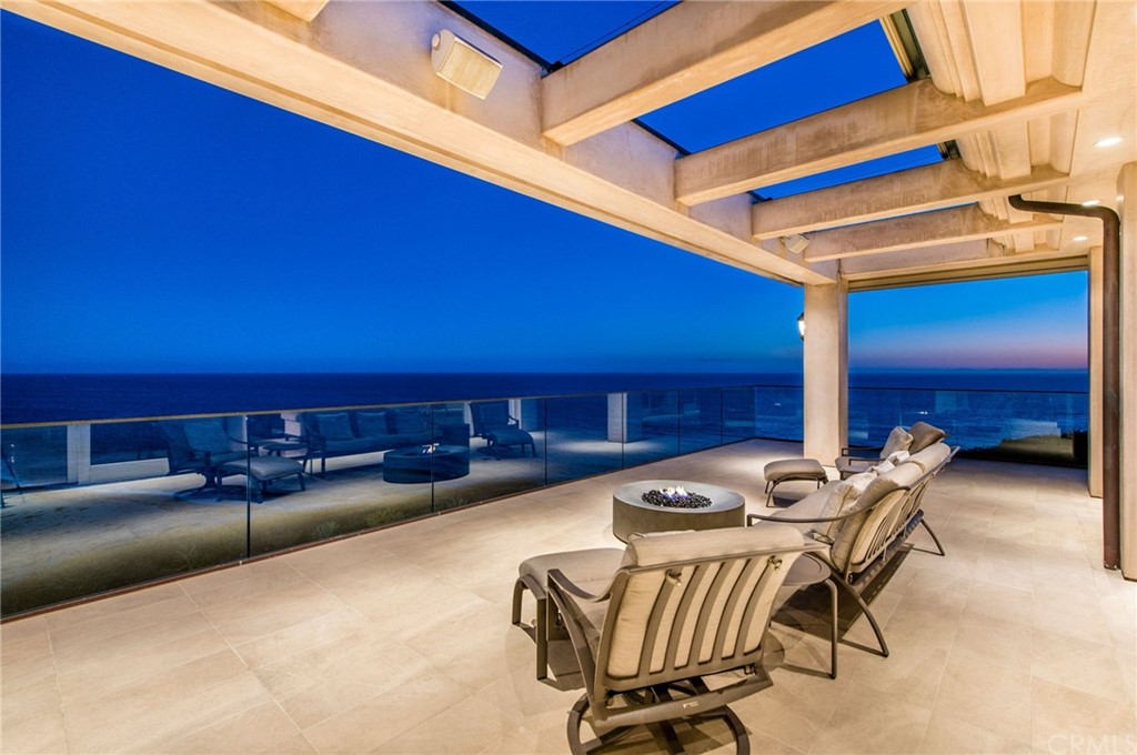 33 Monarch Bay Drive Dana Point, CA 92629 - Photo 41 of 46 a balcony with furniture and a lamp