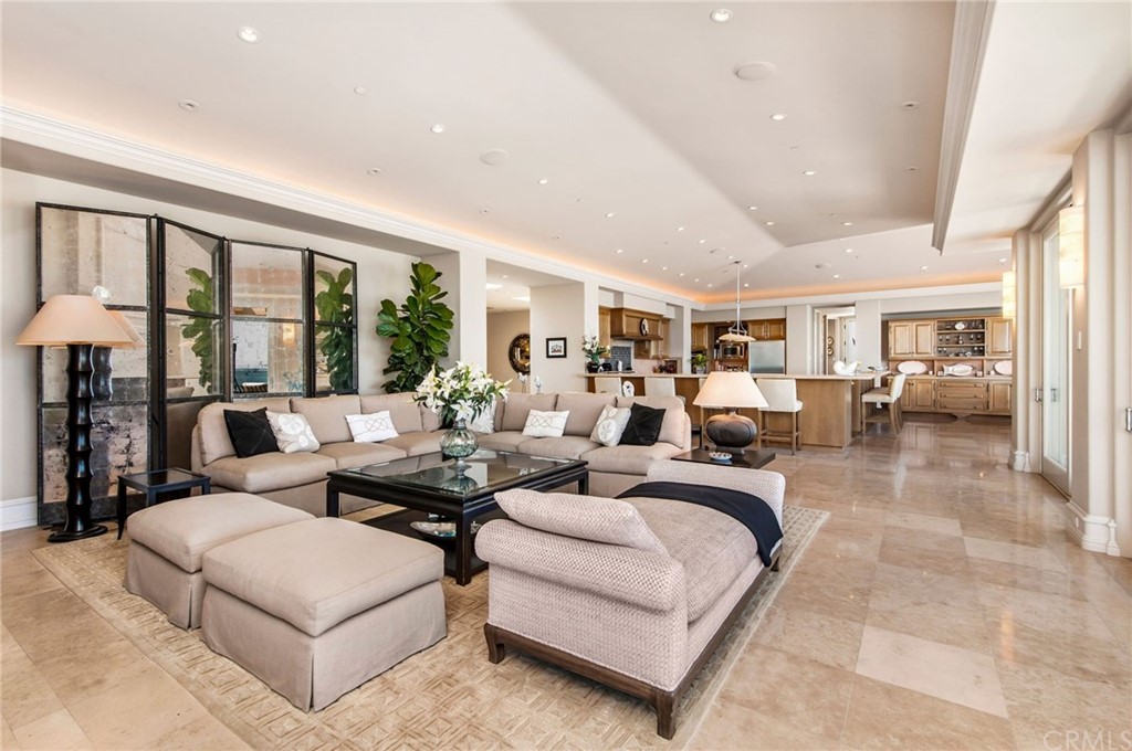 33 Monarch Bay Drive Dana Point, CA 92629 - Photo 8 of 46 a living room with furniture and large windows