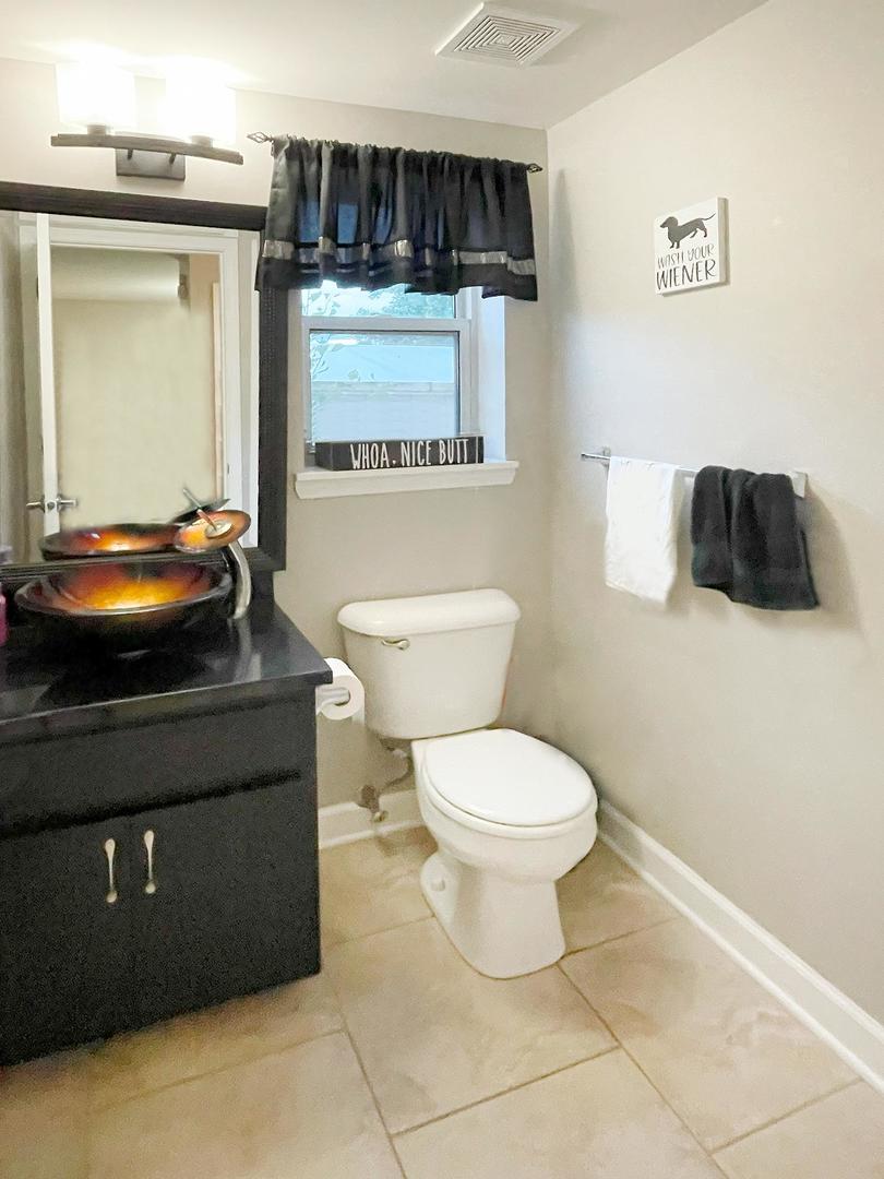 16364 Celtic Circle Manhattan, IL 60442 - Photo 14 of 31 a bathroom with a toilet and a sink