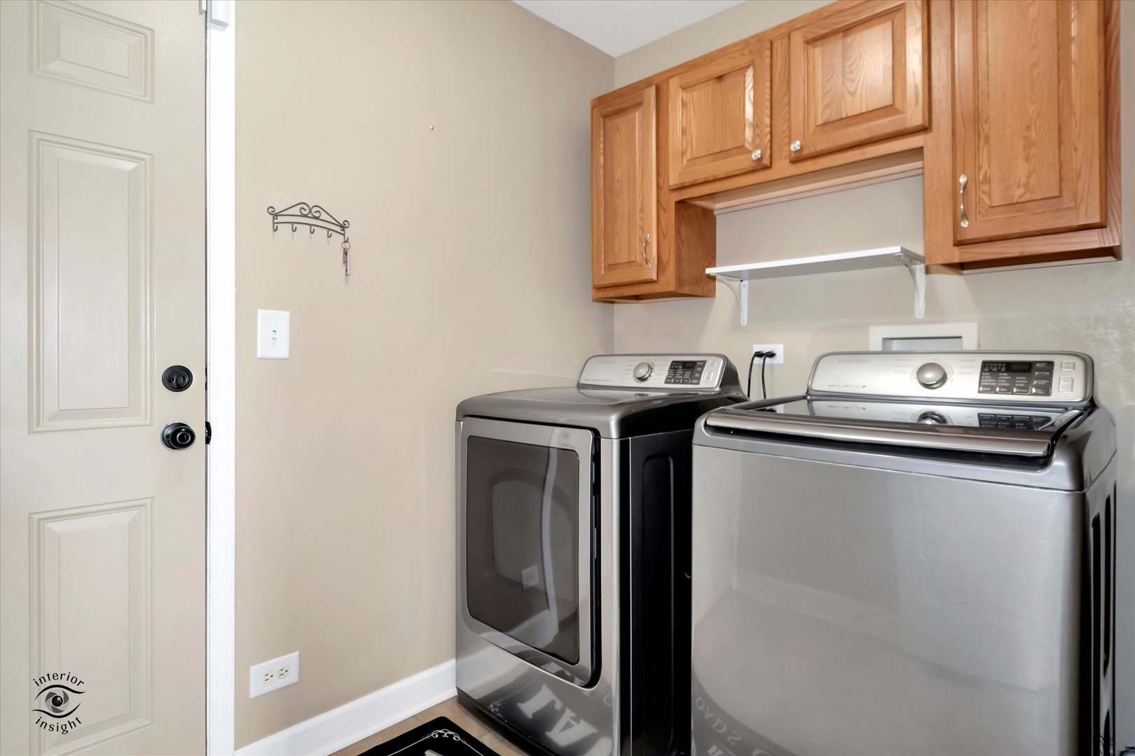 16364 Celtic Circle Manhattan, IL 60442 - Photo 15 of 31 a utility room with stainless steel appliances washer and dryer