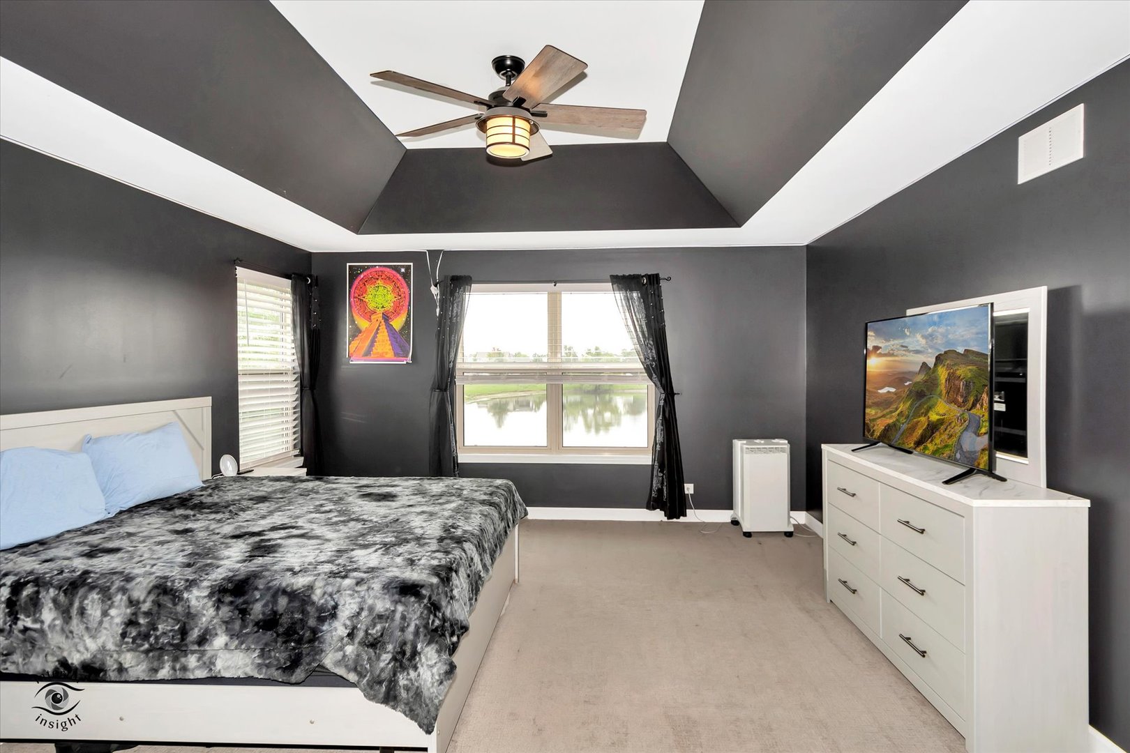 16364 Celtic Circle Manhattan, IL 60442 - Photo 16 of 31 a bedroom with a bed and a flat screen tv