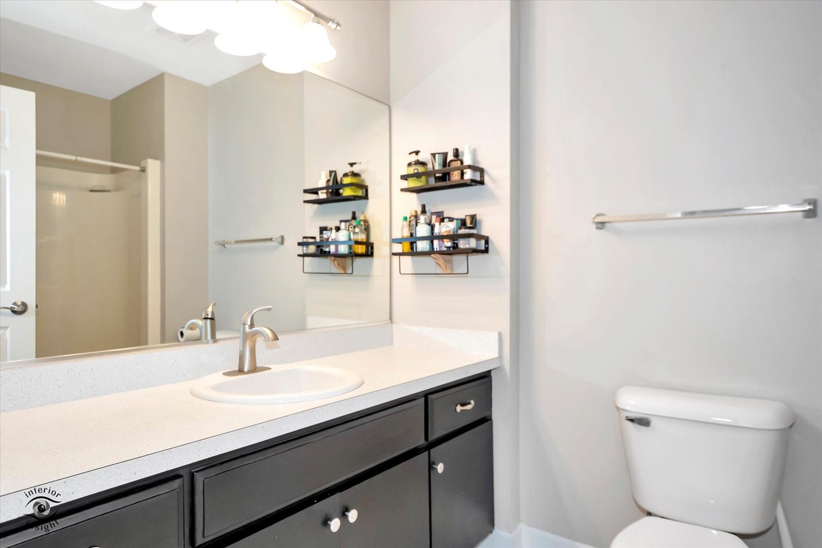 16364 Celtic Circle Manhattan, IL 60442 - Photo 20 of 31 a bathroom with a sink toilet and mirror