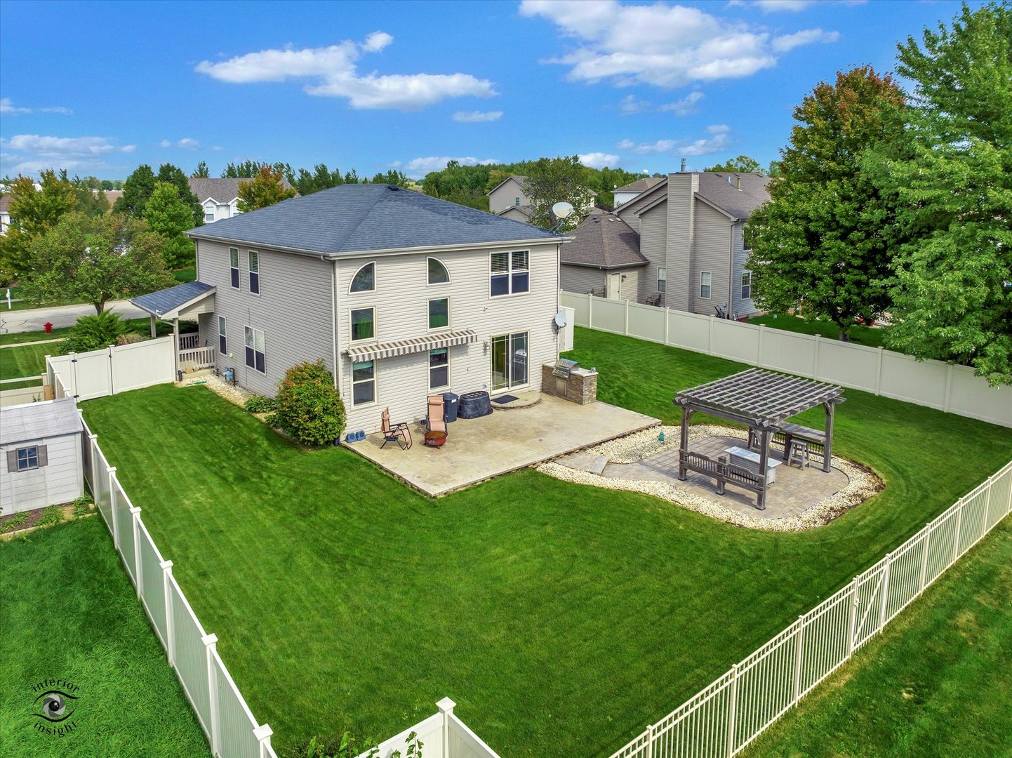 16364 Celtic Circle Manhattan, IL 60442 - Photo 26 of 31 a view of a house with backyard sitting area and garden