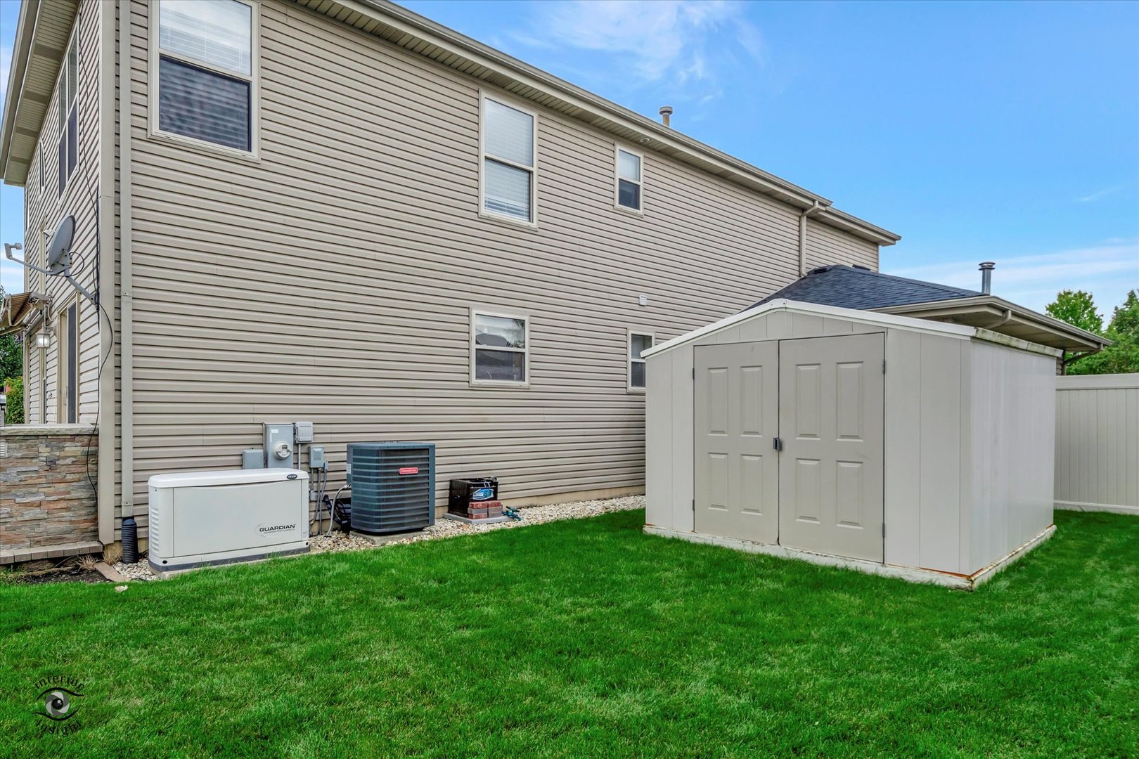 16364 Celtic Circle Manhattan, IL 60442 - Photo 27 of 31 a view of backyard with barbeque and wooden fence