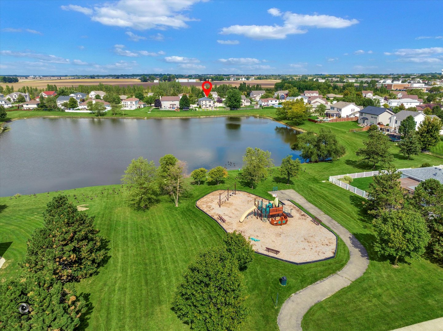 16364 Celtic Circle Manhattan, IL 60442 - Photo 29 of 31 an aerial view of a house with a lake view