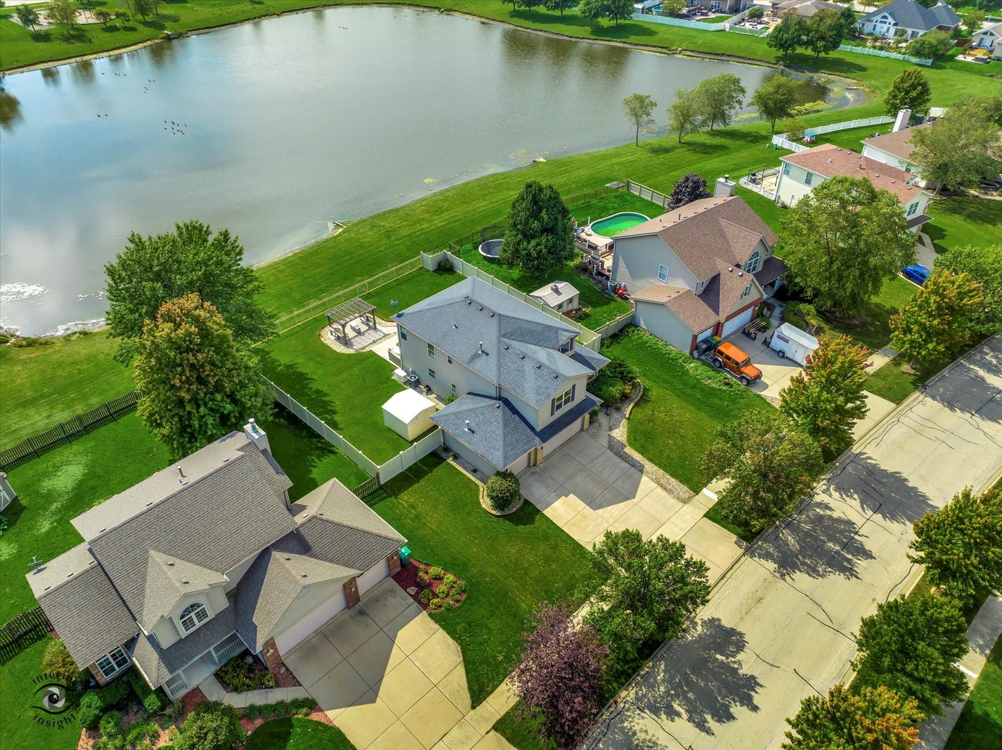 16364 Celtic Circle Manhattan, IL 60442 - Photo 31 of 31 an aerial view of a house with garden space and lake view