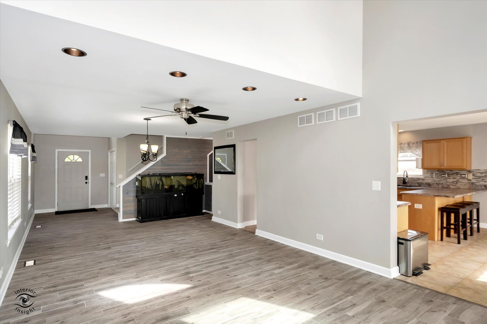 16364 Celtic Circle Manhattan, IL 60442 - Photo 7 of 31 a big room with chandelier and entryway