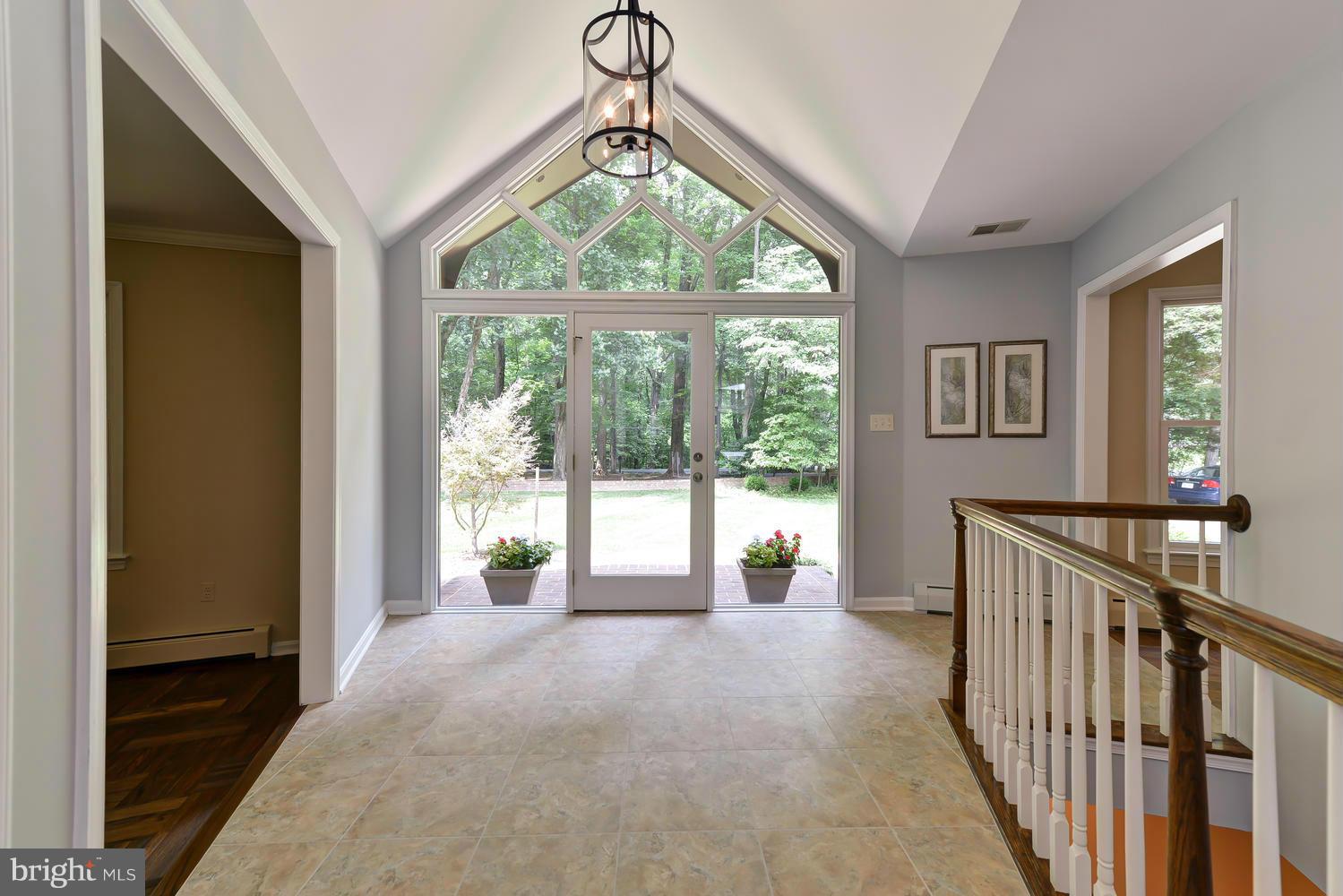 243 Springvale Road Great Falls, VA 22066 - Photo 4 of 30 a view of an entryway with a livingroom