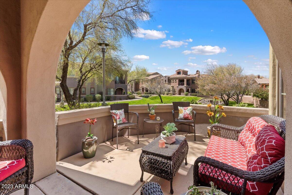 3935 East Rough Rider Road, Unit 1357 Phoenix, AZ 85050 - Photo 4 of 40 Front Patio