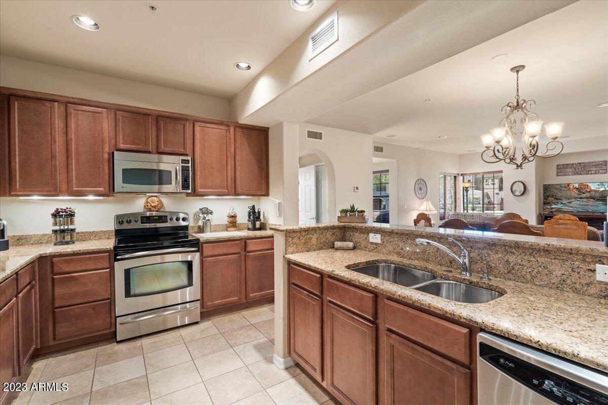 3935 East Rough Rider Road, Unit 1357 Phoenix, AZ 85050 - Photo 6 of 40 06-Kitchen