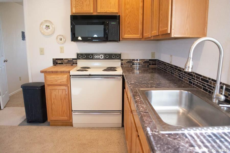 291 Turkey Ridge Road Walsenburg, CO 81089 - Photo 11 of 40 a utility room with dryer and washer