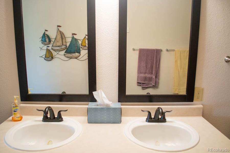 291 Turkey Ridge Road Walsenburg, CO 81089 - Photo 18 of 40 a bathroom with a sink and a mirror