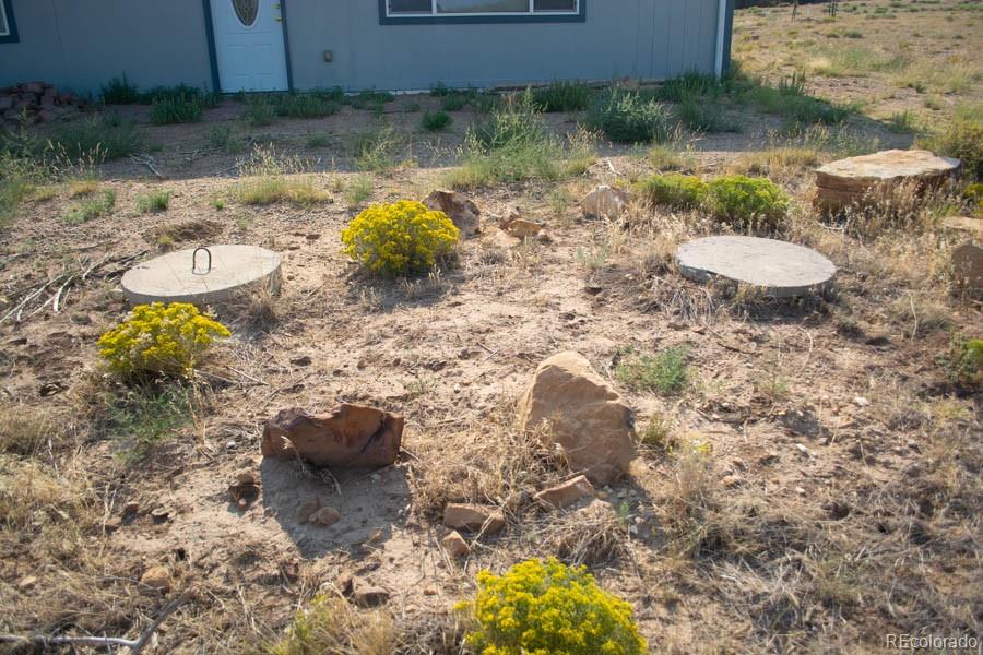 291 Turkey Ridge Road Walsenburg, CO 81089 - Photo 26 of 40 a view of a backyard of a house
