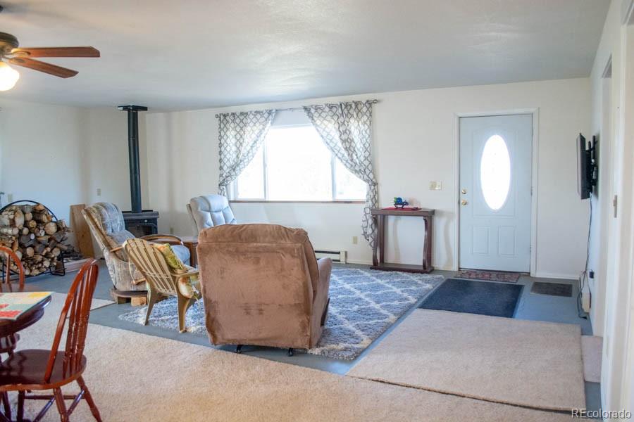 291 Turkey Ridge Road Walsenburg, CO 81089 - Photo 6 of 40 a living room with furniture and a window