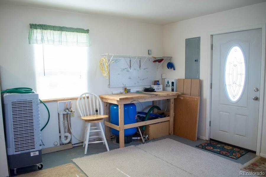 291 Turkey Ridge Road Walsenburg, CO 81089 - Photo 8 of 40 a room with furniture a air conditioner vent and a window
