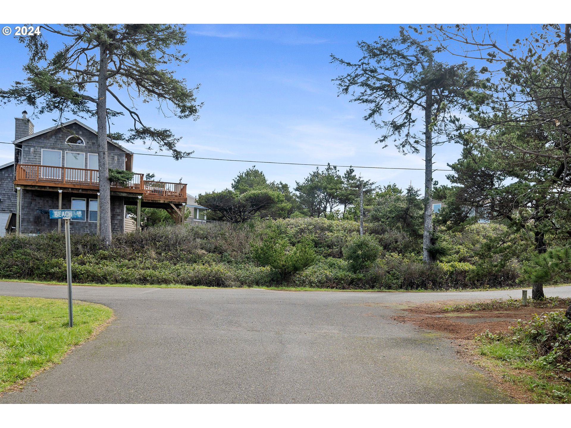 Tobin Lane, Unit TL 9800 Manzanita, OR 97130 - Photo 3 of 10 a view of a house with a yard