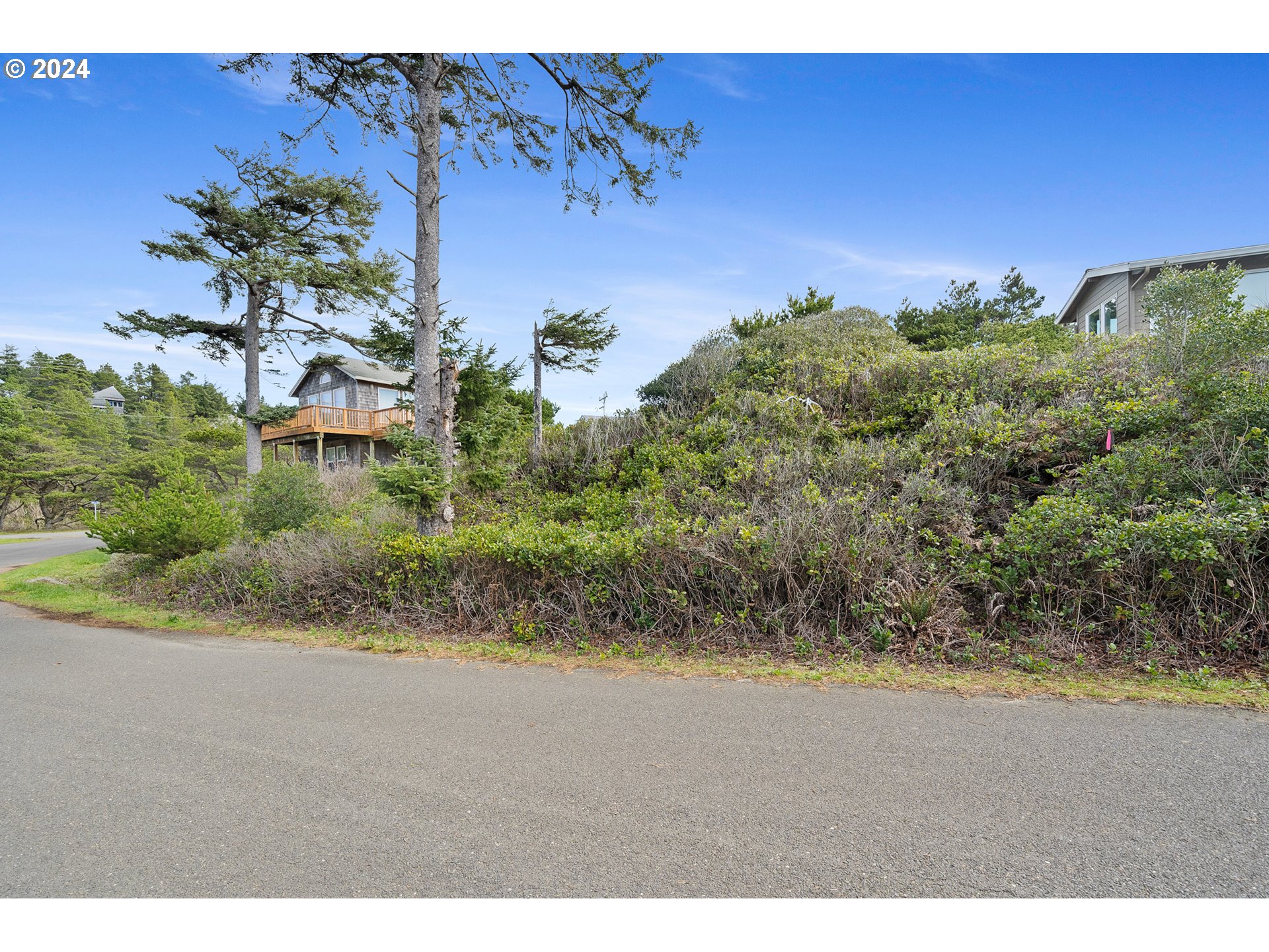 Tobin Lane, Unit TL 9800 Manzanita, OR 97130 - Photo 4 of 10 a view of a yard with a house