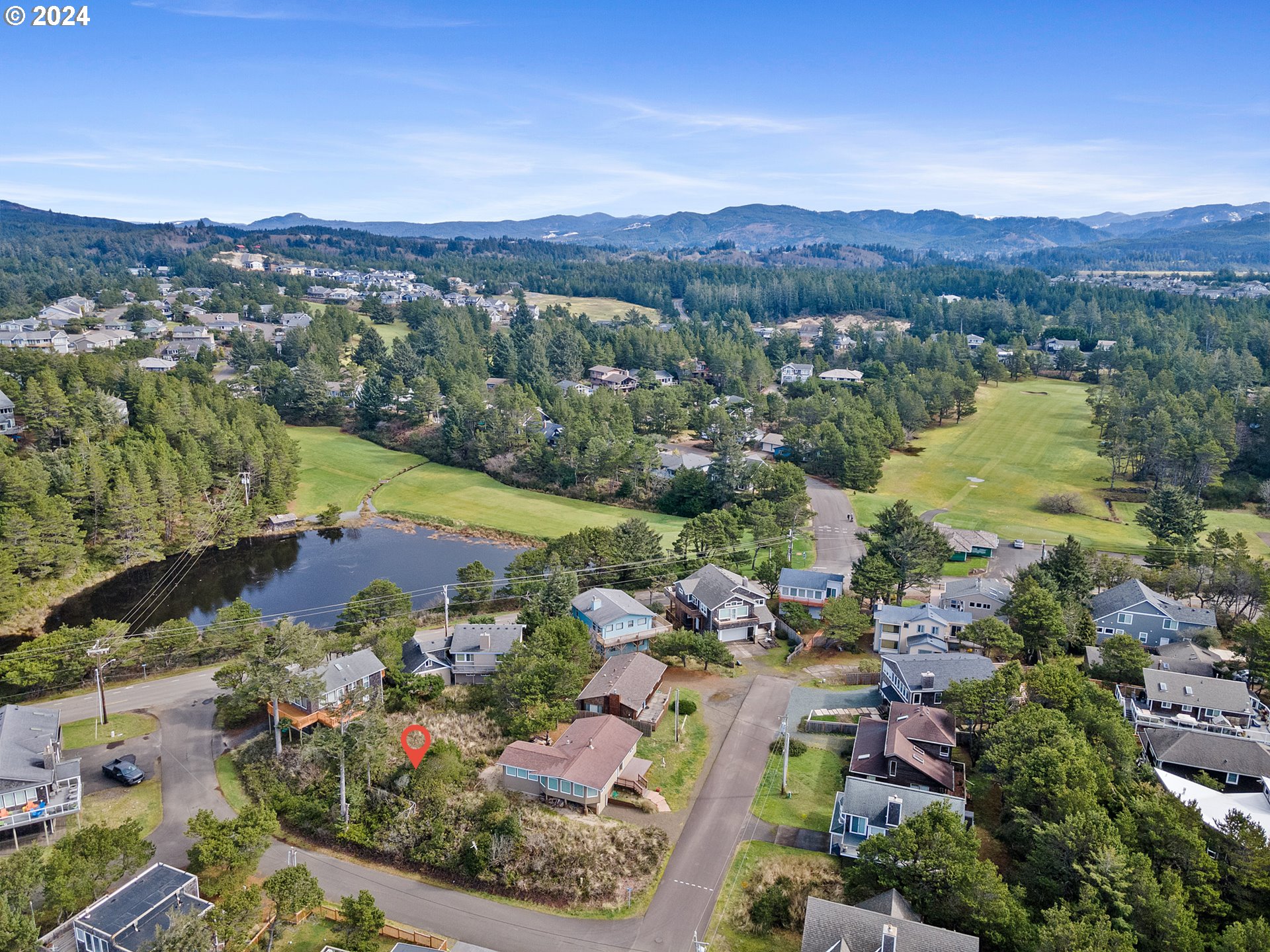 Tobin Lane, Unit TL 9800 Manzanita, OR 97130 - Photo 8 of 10 a view of a city with mountains in the background
