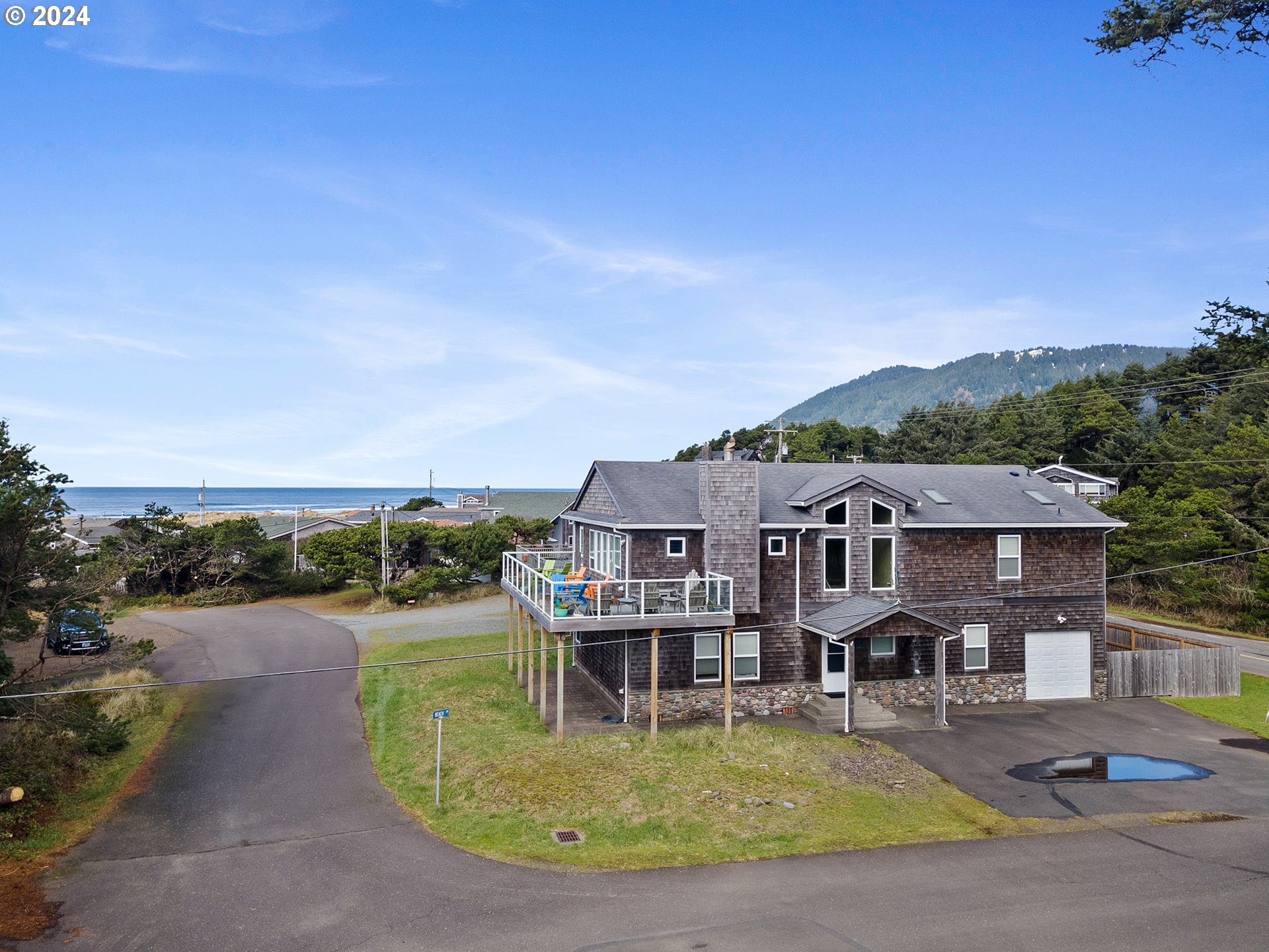 Tobin Lane, Unit TL 9800 Manzanita, OR 97130 - Photo 10 of 10 an aerial view of a house with outdoor space swimming pool and lake view