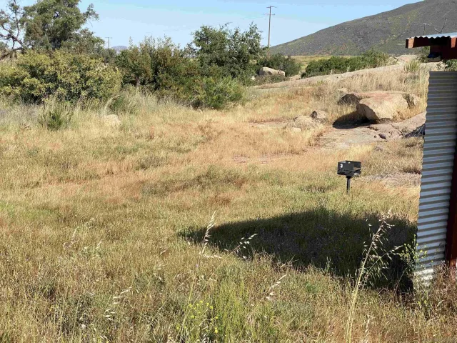 a view of swimming pool from a lake view
