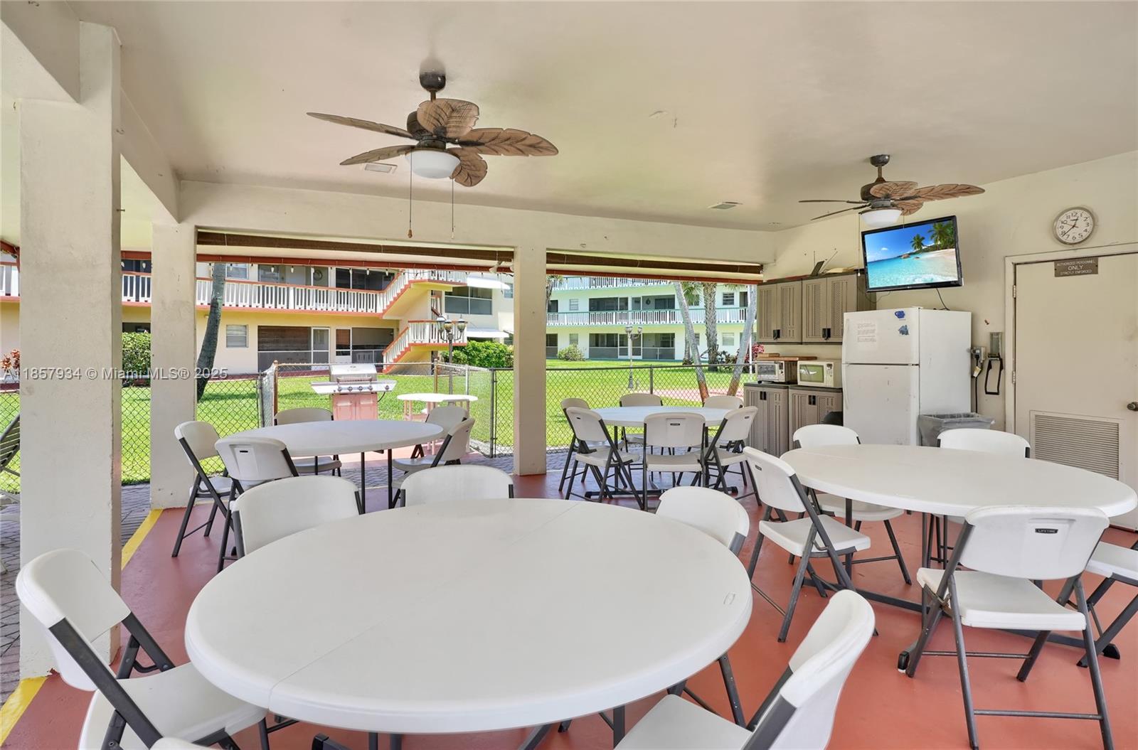 5300 Washington Street, Unit I205 Hollywood, FL 33021 - Photo 17 of 20 a view of a dining room with furniture window and outside view