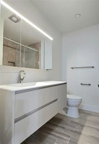 a bathroom with a sink and a toilet