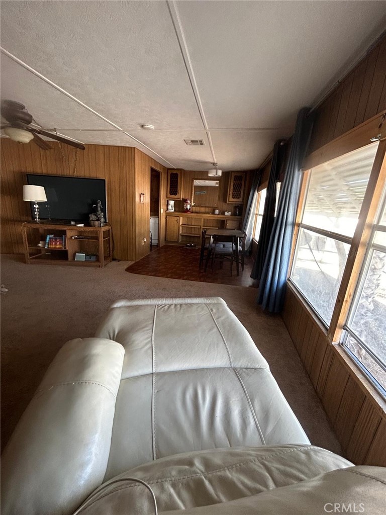 210 Ward Avenue Ridgecrest, CA 93555 - Photo 15 of 19 a view of livingroom with furniture staircase and a fireplace