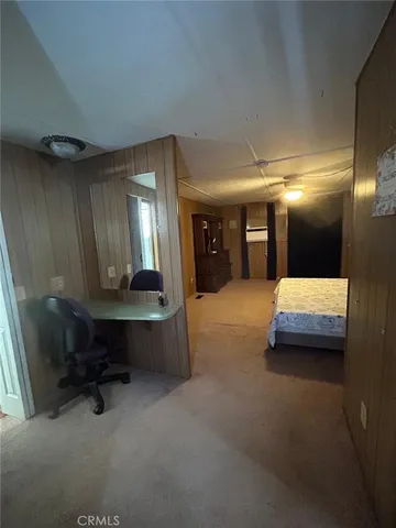 a bathroom with a sink mirror and a bathtub