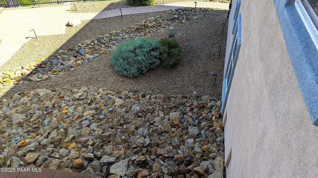 a view of a patio with swimming pool