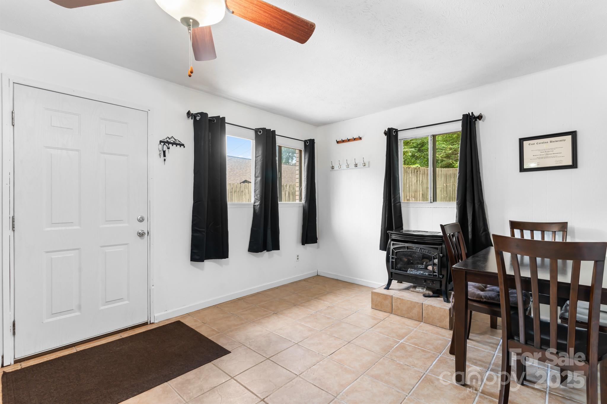 245 Hookers Gap Road Candler, NC 28715 - Photo 22 of 44 a view of a livingroom with furniture and window