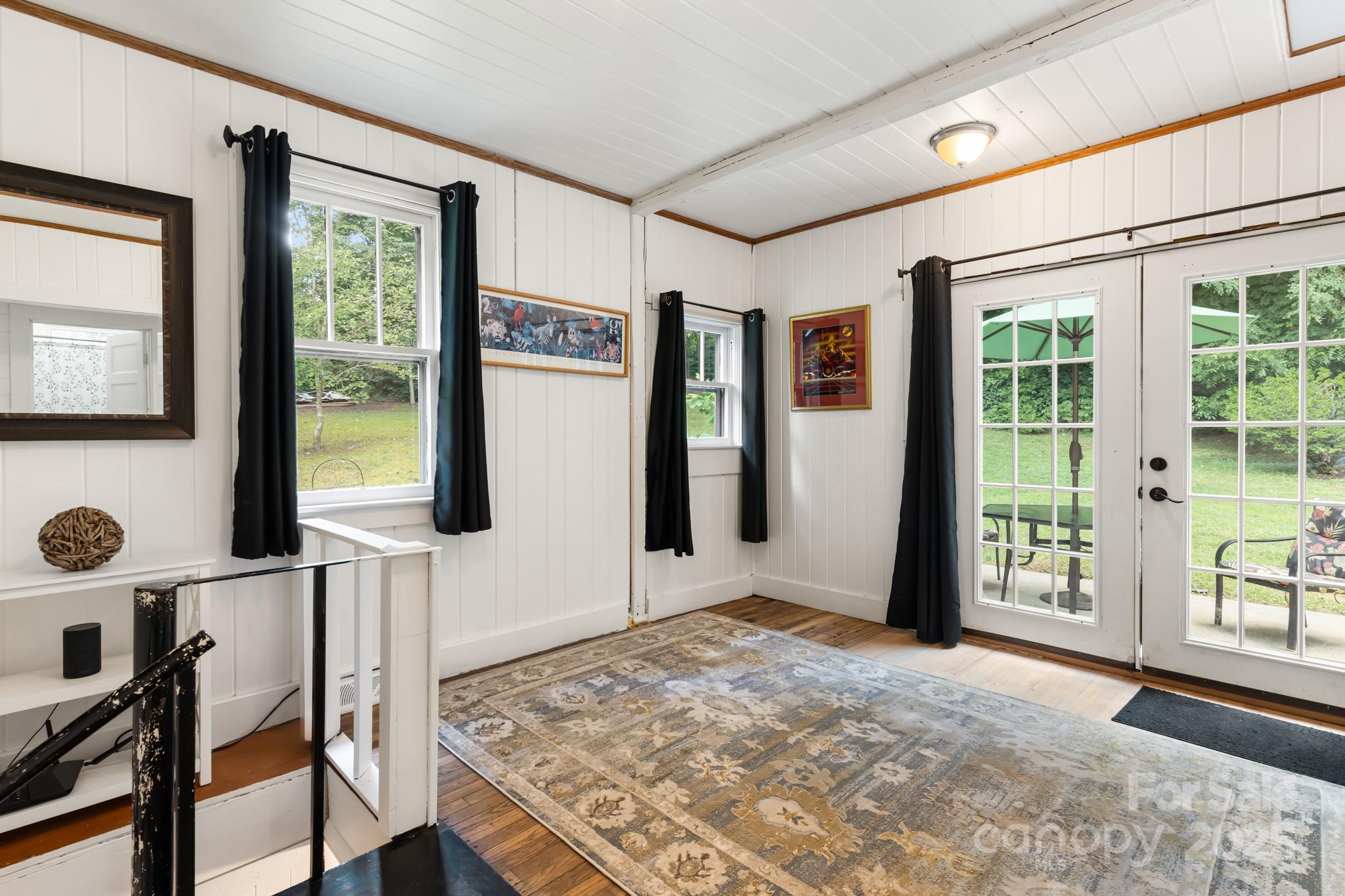 245 Hookers Gap Road Candler, NC 28715 - Photo 8 of 44 a view of livingroom with furniture window and front door