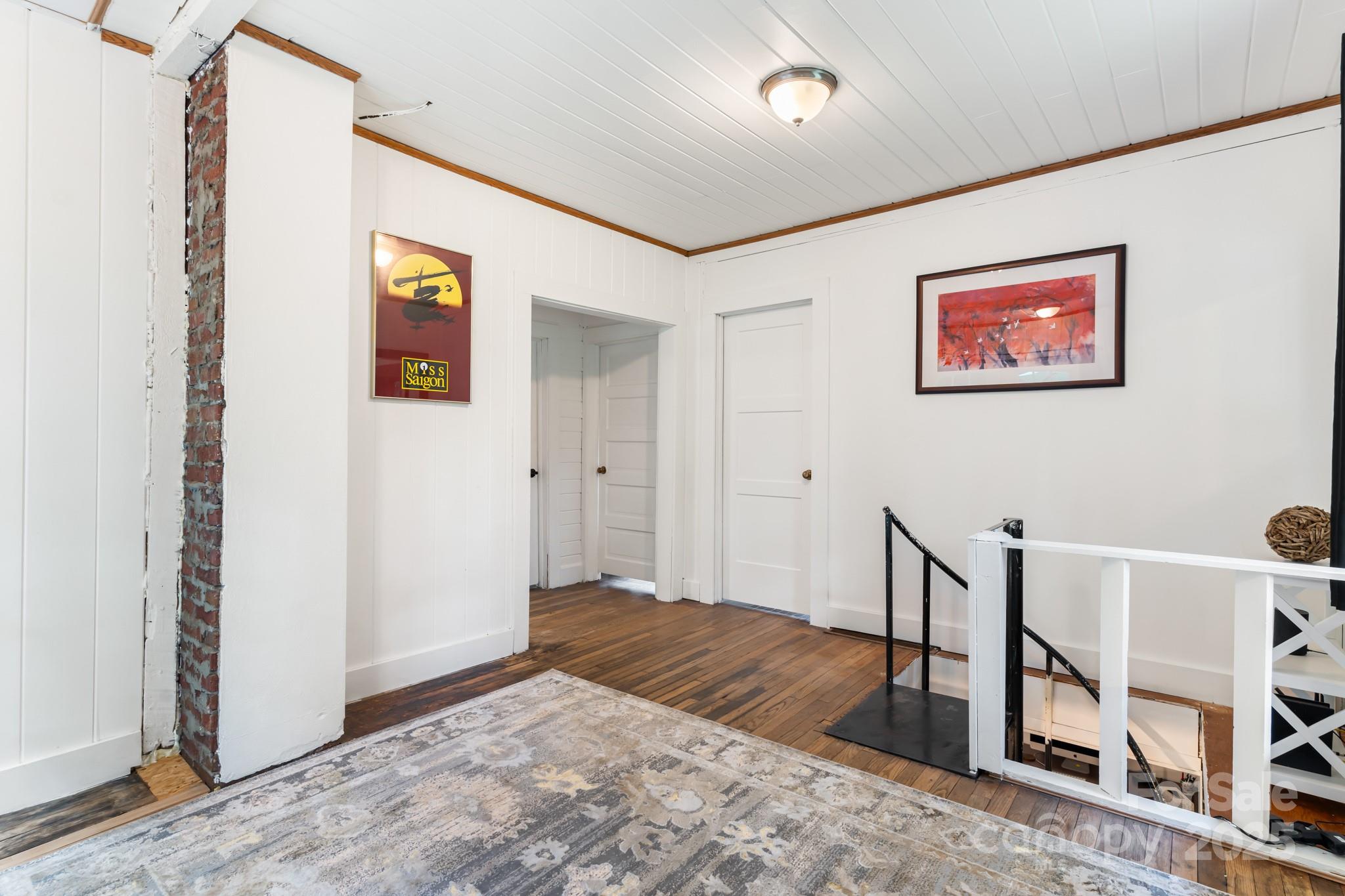 245 Hookers Gap Road Candler, NC 28715 - Photo 10 of 44 a bedroom with a bed and a window